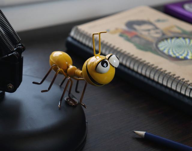 metal ant figurine - yellow