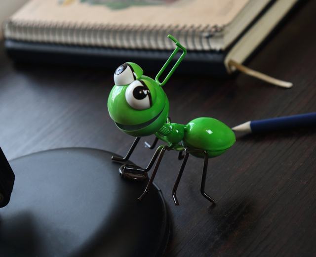 metal ant figurine - green